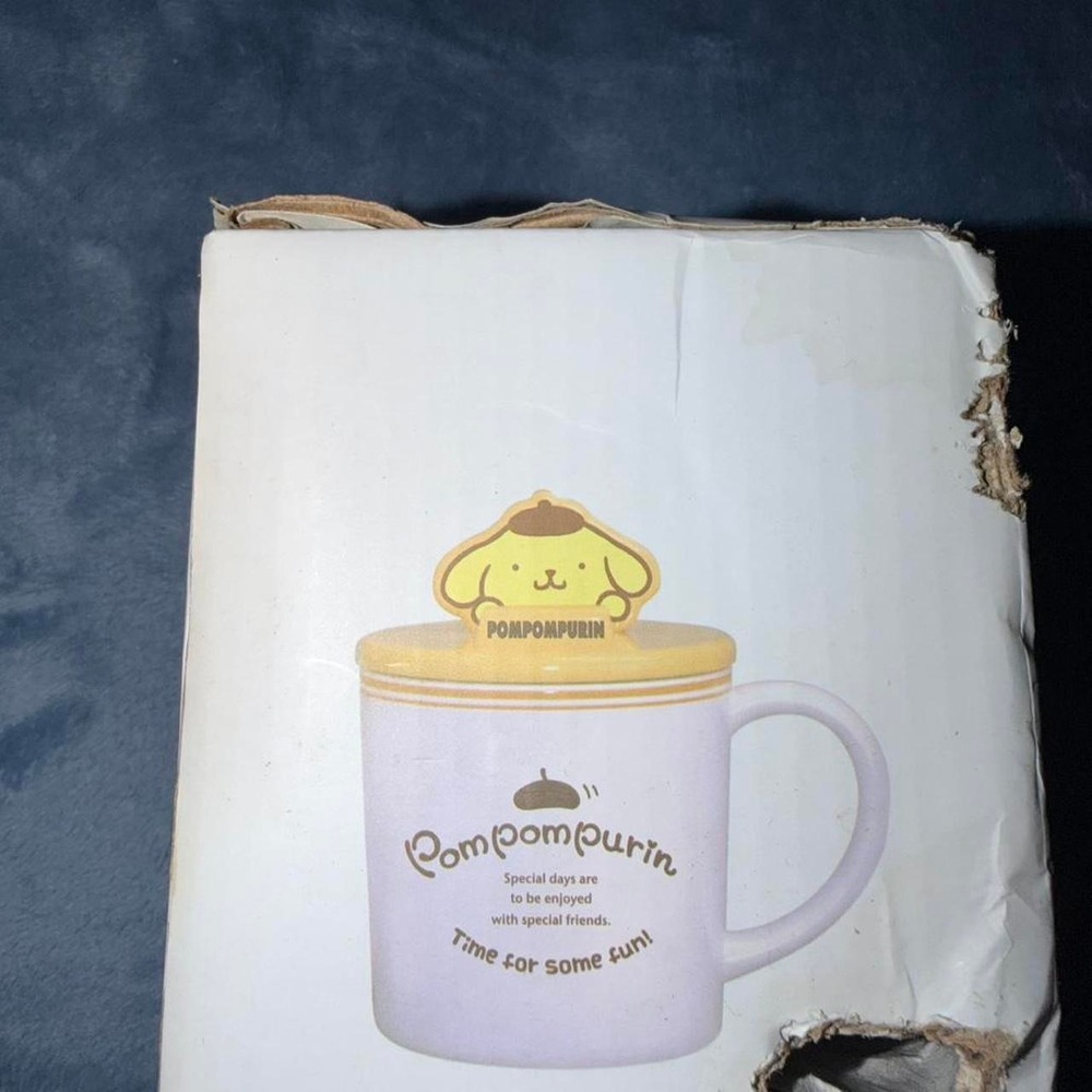 Pompompurin phone stand mug